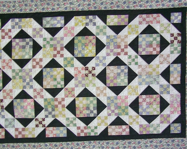 Superficie textil decorada vista de cerca fondo abstracto cubierta de tela ornamental