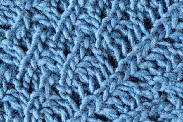 Superficie de textura de lana tejida, macro. Suave gris azul merino lana patrón telón de fondo, primer plano. Otoño e invierno laicos. Estilo minimalista escandinavo