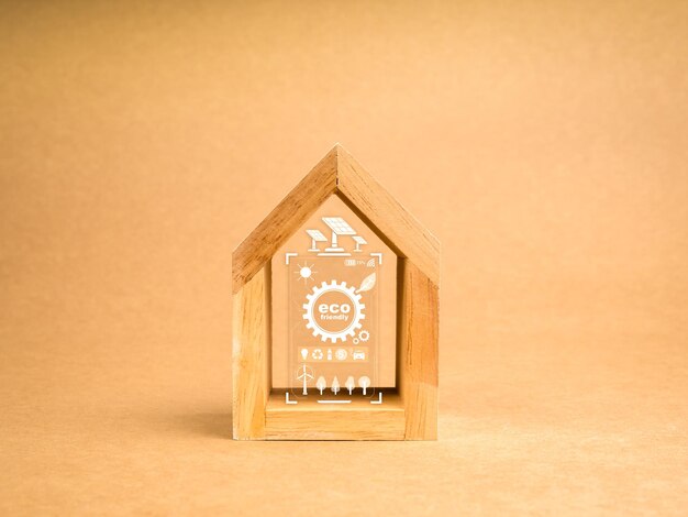 Sustentabilidade no conceito de casa Casa de madeira moderna branca com ícone de sistema de painéis solares em exibição digital no interior em fundo de papel reciclado castanho tecnologias e práticas ecológicas mínimas
