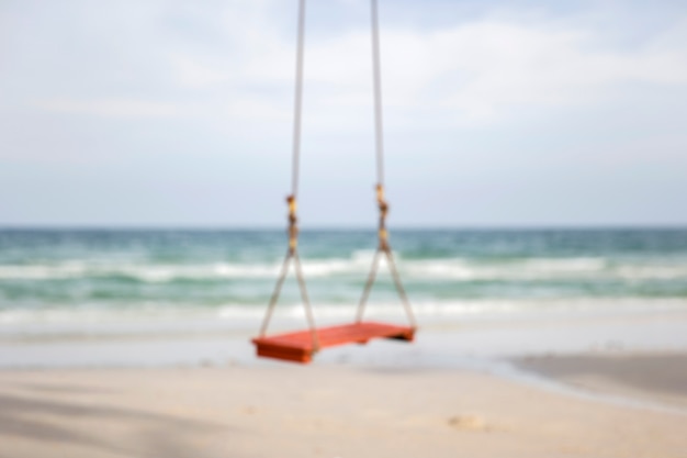 Foto swing em uma praia tropical