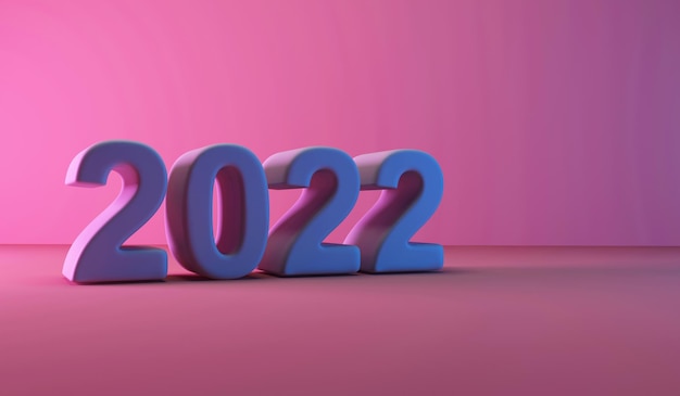 Foto symbol des neuen jahres 2022 auf rosa studiohintergrund