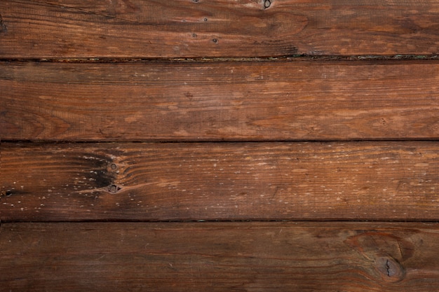 Tabla de cortar de madera rayada marrón. Textura de madera