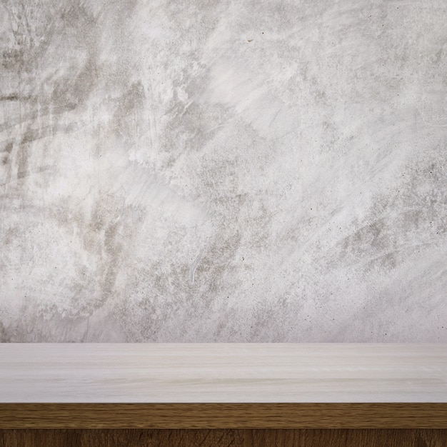 Tabla de madera y fondo de textura de pared de cemento con espacio para el montaje de pantalla de producto.