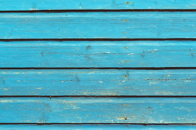 Tablas de madera vieja textura y fondo de color azul pálido