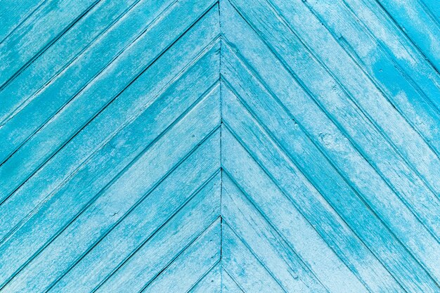 Tablero de madera Primer plano del fondo de textura de madera pintada de azul.