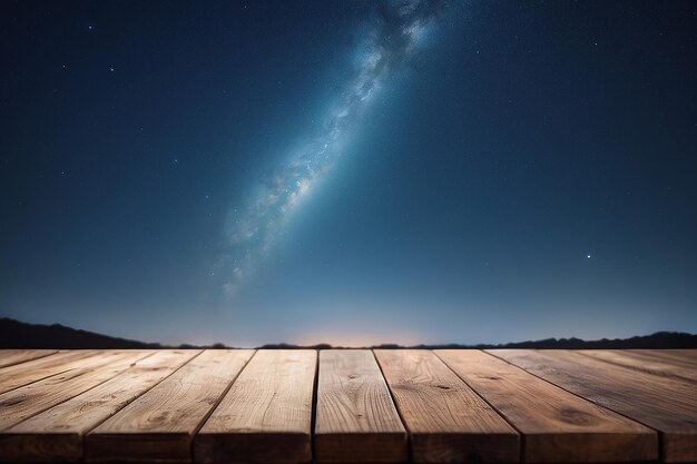 Foto un tablero de madera vacío con un cielo estrellado desenfocado