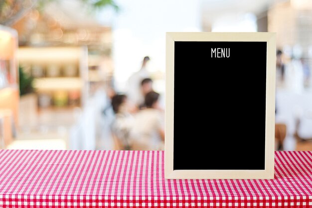 Foto tablero del menú en blanco sobre el concepto de fondo, comida y bebida de café de desenfoque