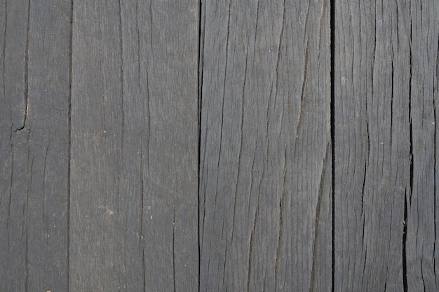 Tableros de madera clavados verticalmente Textura de madera Fondo de color madera oscura con espacio de copia