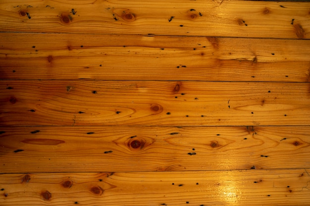 Tableros de madera pintaron el fondo de la mesa.