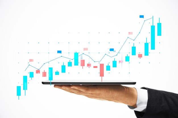 Tableta de negocios con gráfico financiero digital en fondo blanco