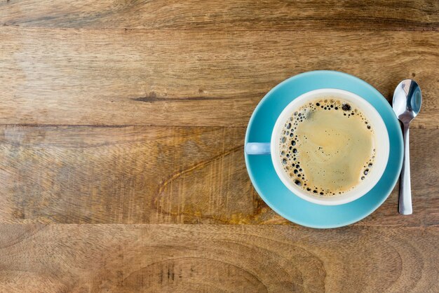 Taça de café na mesa.