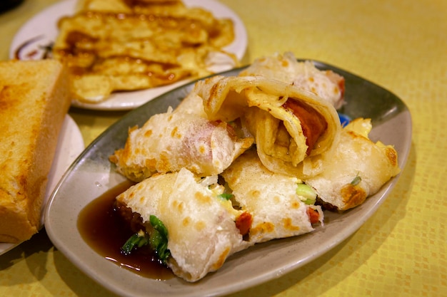 A Taiwán le gusta mucho el delicioso desayuno tortilla de jamón y verduras