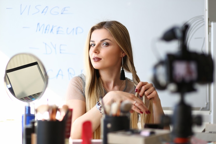 Foto taller de blog de belleza de transmisión de vlogger femenina