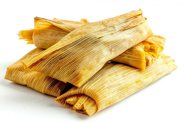 Tamales mexicanos hechos de maíz y pollo