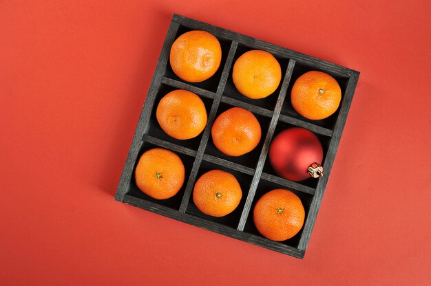 Tangerinas com caixa de madeira