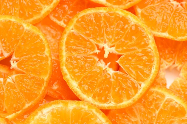 Foto tangerinas frescas e suculentas em fatias