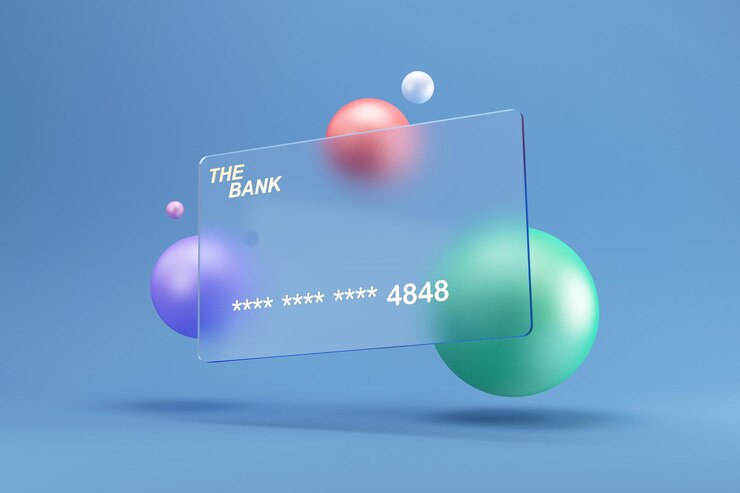 Foto tarjeta de crédito transparente con esferas de color sobre fondo azul de estudio