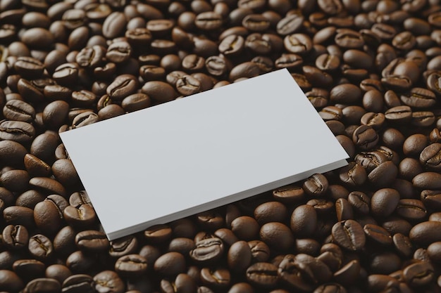 Foto una tarjeta de presentación encima de una pila de granos de café