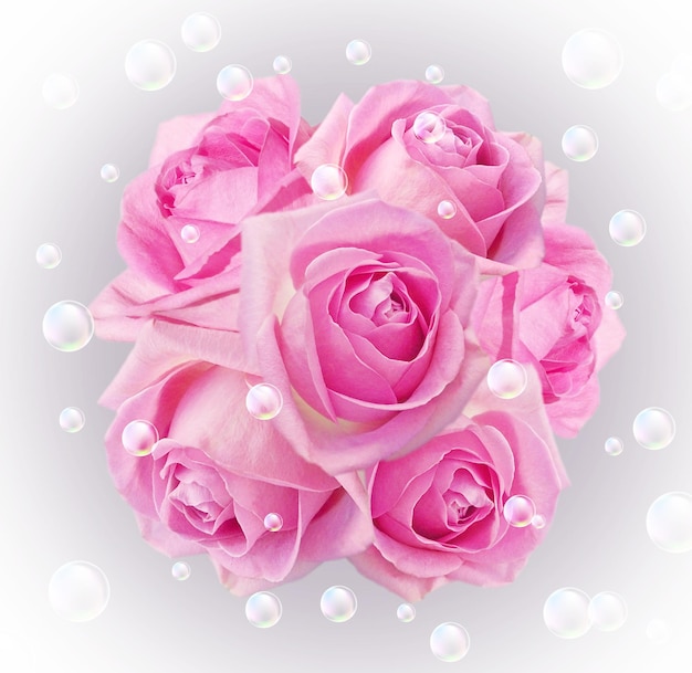 Tarjeta con ramo de rosas y burbujas.