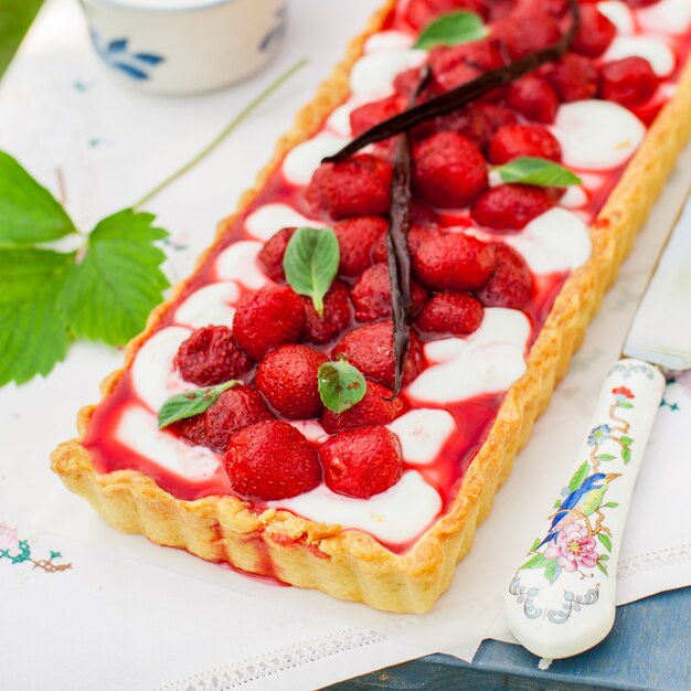 Tarta de cuajada de naranja con fresas de vainilla