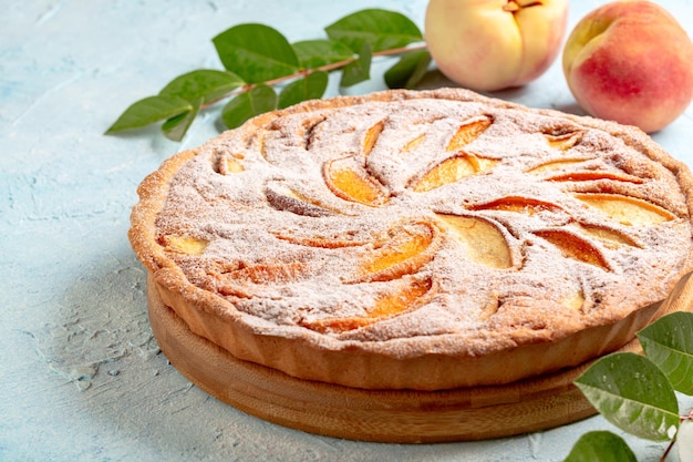 Tarta de melocotón con crema de almendras