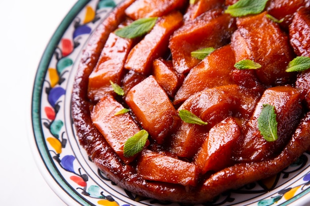 Tarte tatin de papaia. Sua peculiaridade é que é um bolo invertido, ou seja, para seu preparo