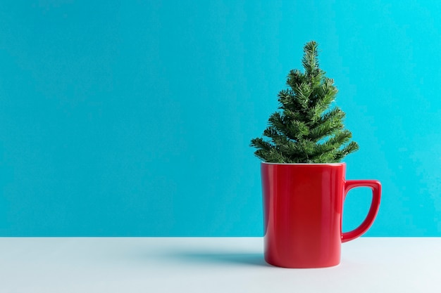 Taza de café con árbol de Navidad