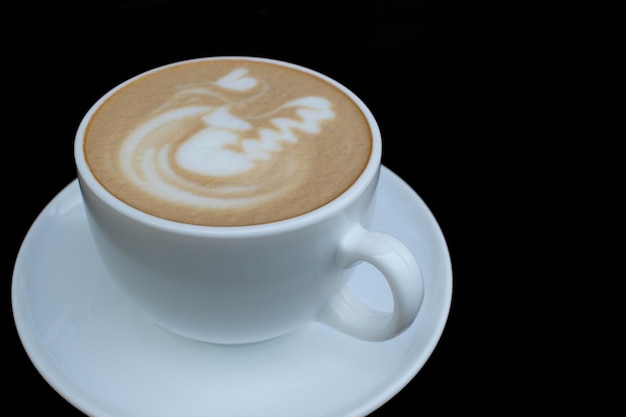 Taza de café en una mesa de madera