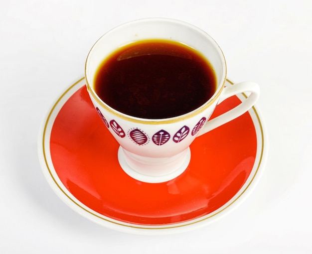 Taza de café sobre un fondo blanco