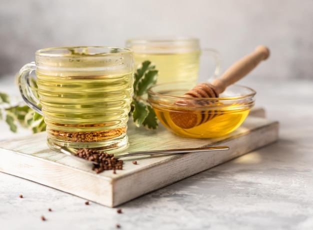 Taza con gránulos de té de trigo sarraceno y miel Superalimento Taiwán Ku Qiao té de trigo sarraceno