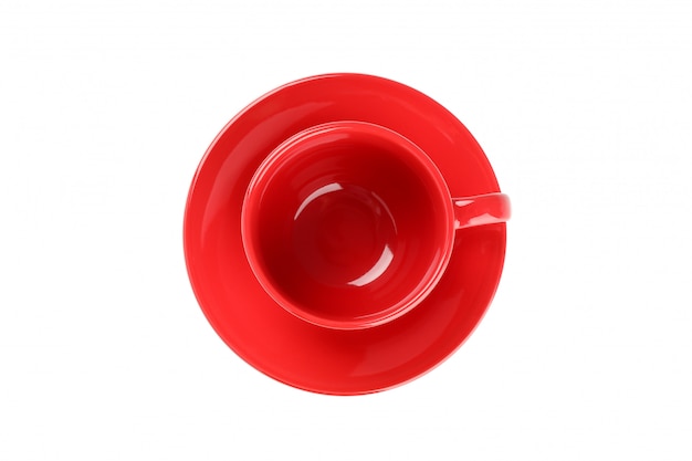 Taza roja y placa aislada en blanco