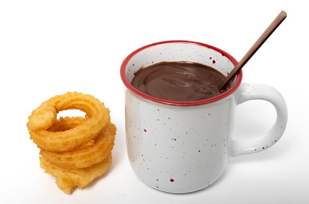 Taza de salsa de chocolate con churros