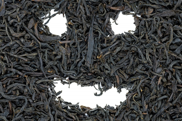 Té del oolong de Da Hong Pao, cara sonriente divertida, cierre para arriba.