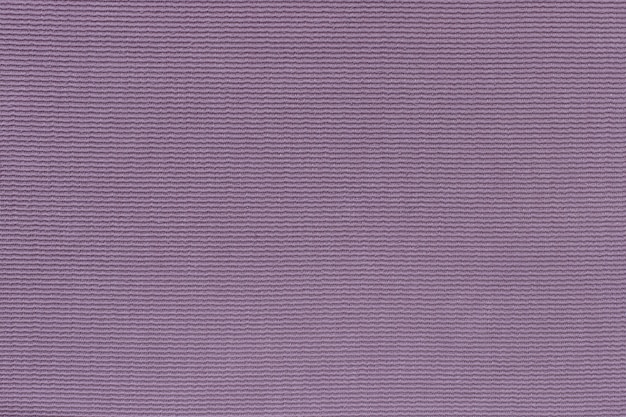 Foto tecido com nervuras roxo. textura de tecido de veludo