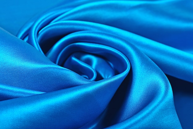 Tecido de cetim azul natural como textura de fundo