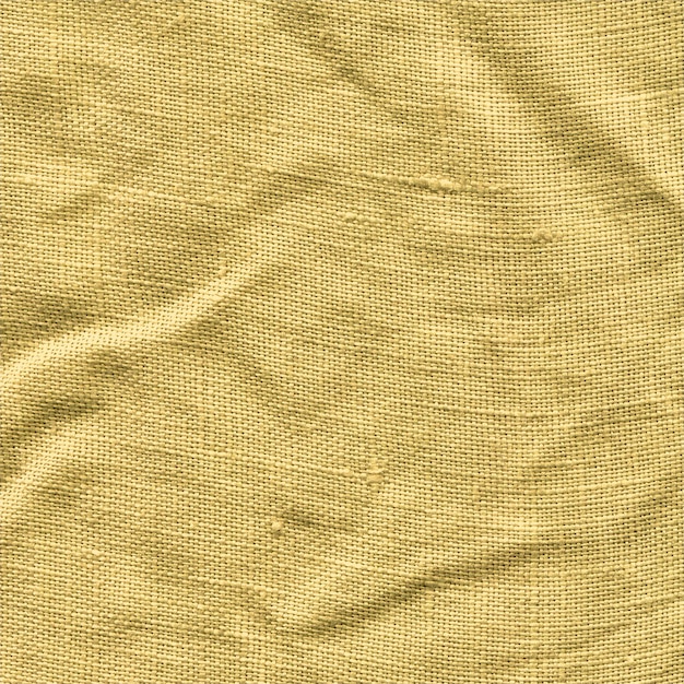 Tecido de pano amarelo mostarda Closeup de tecido de cor mostarda