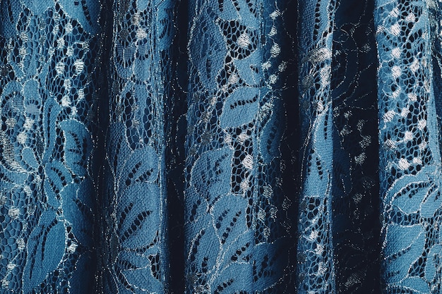 Tecido de renda azul com padrão floral