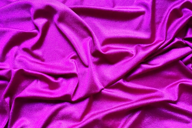 Tecido de veludo semelhante à seda Têxteis em dobras e belas ondas Roxo rosa magenta