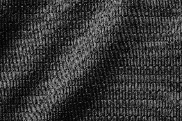 Tecido esporte preto tecido camisa de futebol textura jérsei close-up