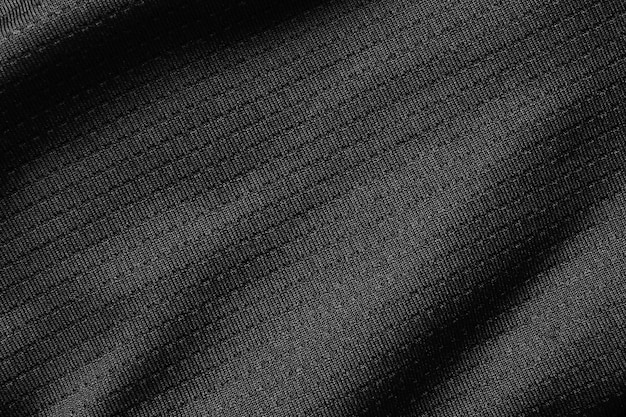 Tecido esporte preto tecido camisa de futebol textura jérsei close-up