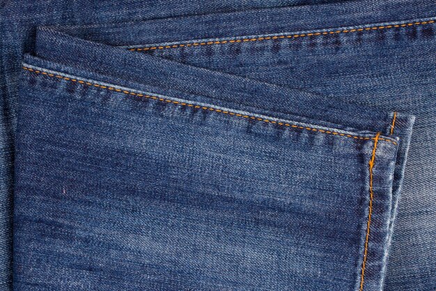 Tecido jeans azul. Textura de jeans ou fundo de jeans.