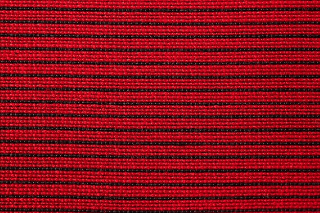 tecido multicolorido feito de fundo de textura de fios vermelhos e brancos bege