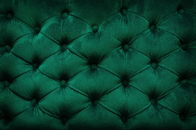 Tecido verde de veludo acolchoado como pano de fundo