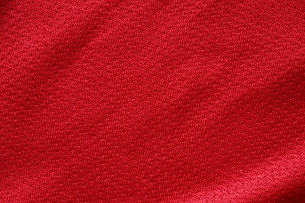 Tecido vermelho para roupas esportivas, camisa de futebol, textura de jérsei close-up