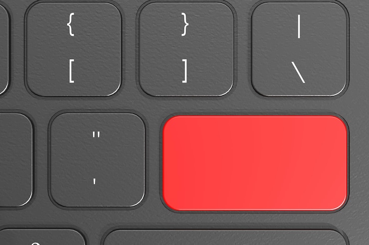 Foto tecla enter roja en el teclado negro