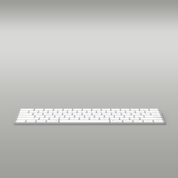 Teclado blanco aislado de una computadora personal sobre un fondo gris