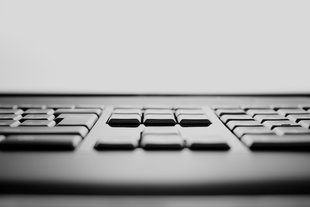 Teclas de teclado blanco y negro horizontal fondo bokeh hd