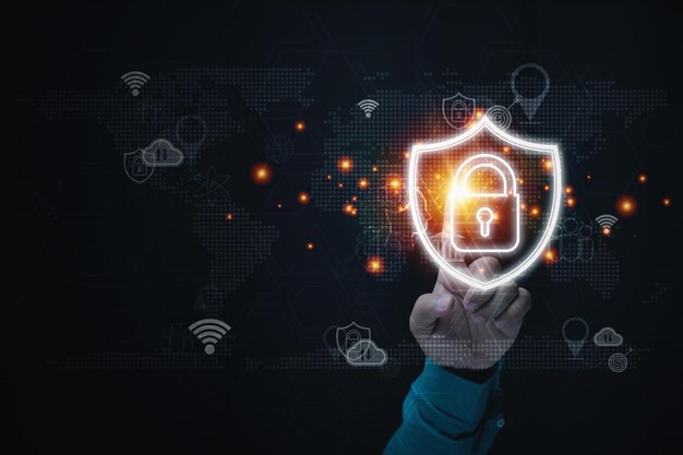 La tecnología de seguridad para proteger los datos privados de un dedo apuntando a un candado con un escudo para salvaguardar la violación de la protección de la red de Internet de la tecnología de privacidad