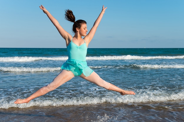 Teenager girl dancing outdoor