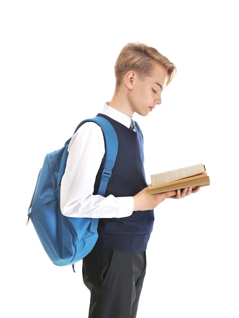 Teenager mit rucksack und lehrbuch